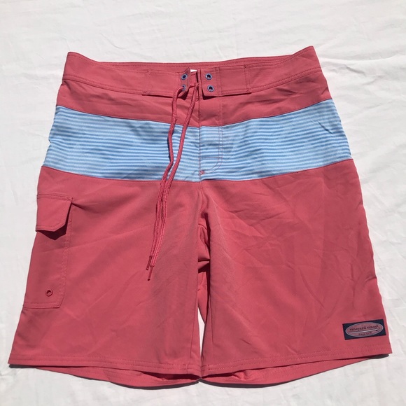 pink and blue swim trunks